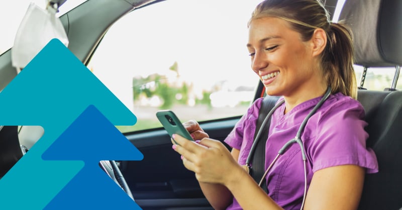 Care worker using a mobile phone in car